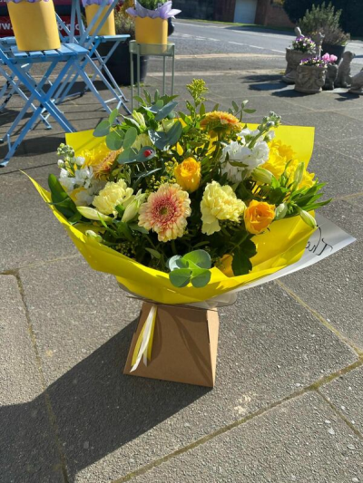 Sunrise - A gorgeous aquapack full of bright seasonal blooms, filled with mixed foliage and presented in water.