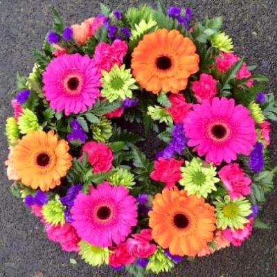 Vibrant textured wreath - A floral wreath designed in vibrant colours, sizes as follows

*please note, flowers may differ due to seasonal availability.