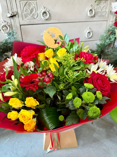 Red Forest - A joyful and exclusive collection of flowers and foliages make this holiday gift the ultimate in surprises for any friend or family.