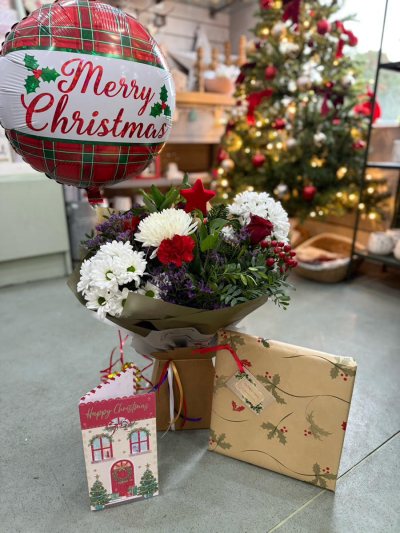 Merry Christmas Package - A festive package which includes a florist choice aqua pack, gift wrapped chocolates, large seasonal card and a festive balloon.